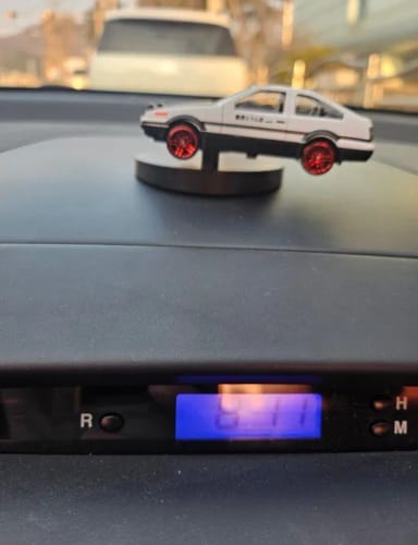 Customer photo review of Novel and Funny Drifting Car Model – Dynamic Moving Dashboard Decoration