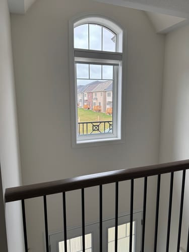 Customer photo review of SmartWings Motorized Light Filtering Roller Shades 70% Blackout Essential