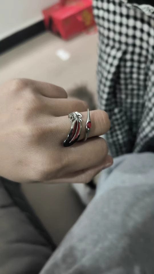 Customer photo review of "Soaring Cranes" 925 Sterling Silver Red Feather Crane Statement Open Ring