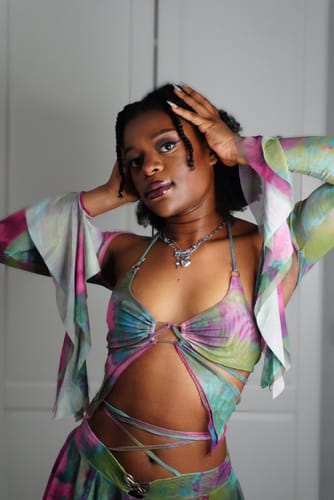 Customer photo review of Flared sleeve tie dye o ring self tie halter low cut mini skirt set