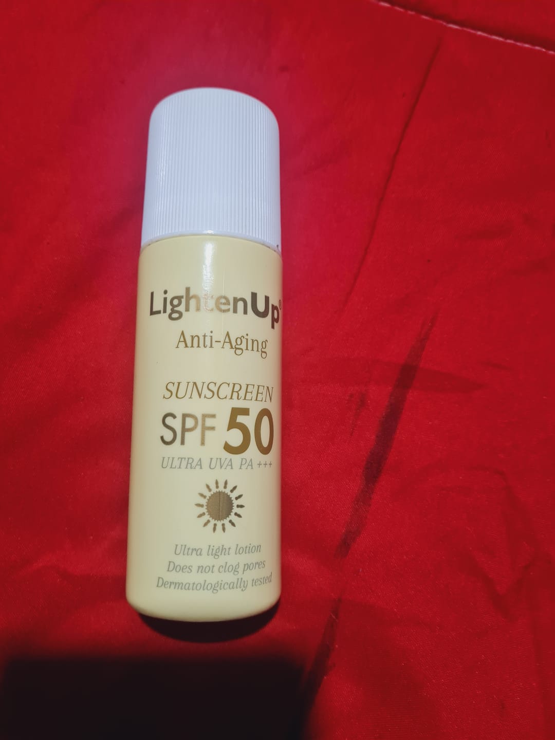 Customer photo review of LightenUp Anti-Aging Sunscreen SPF 50