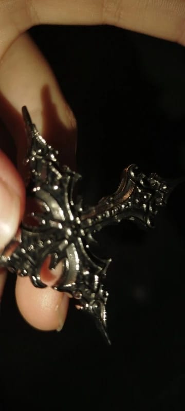 Customer photo review of Spire Cross Necklace