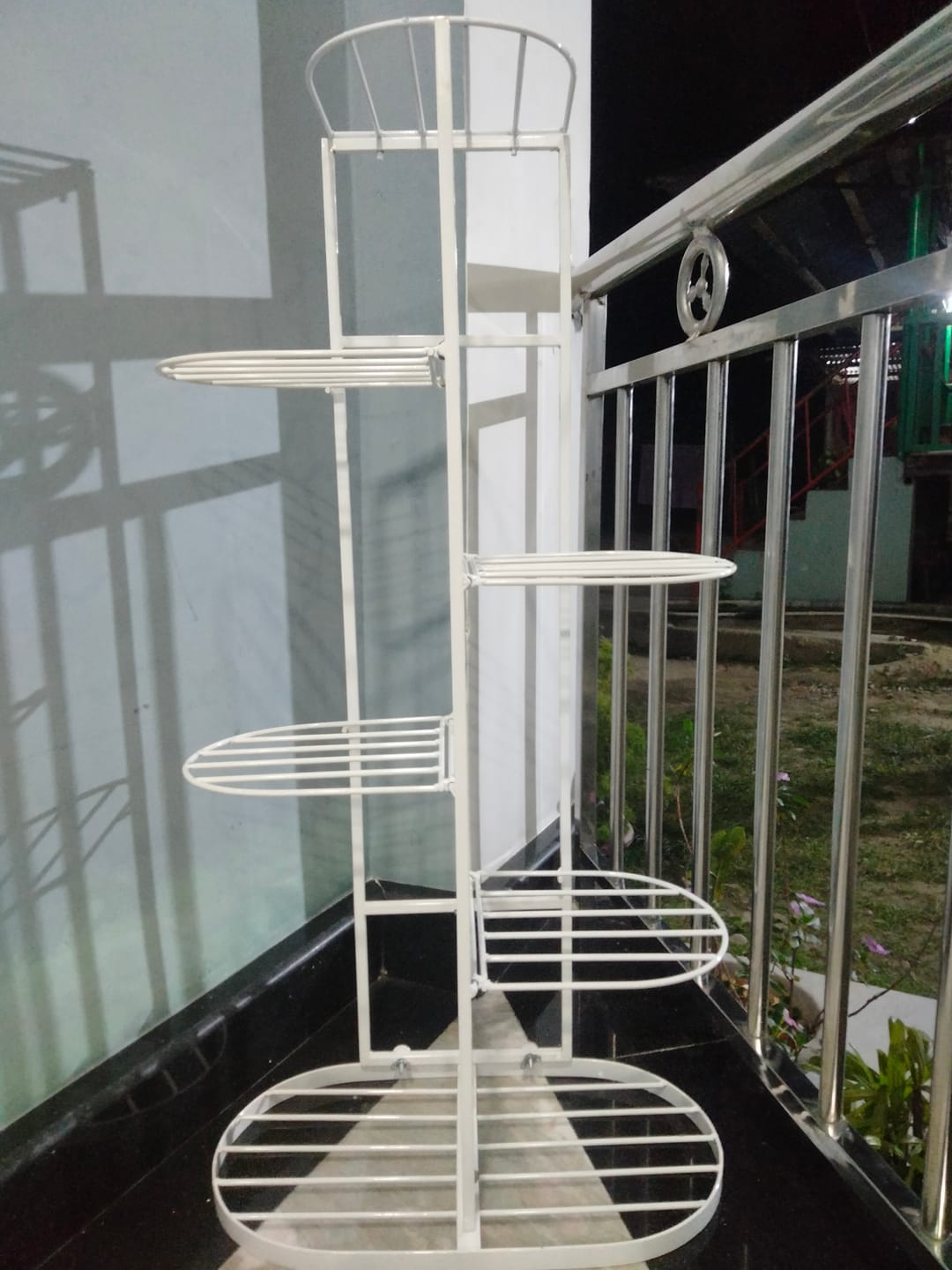 Customer photo review of UnitedCrafts 6 Tier 7 Potted Metal Plant Stand Multiple Shelves