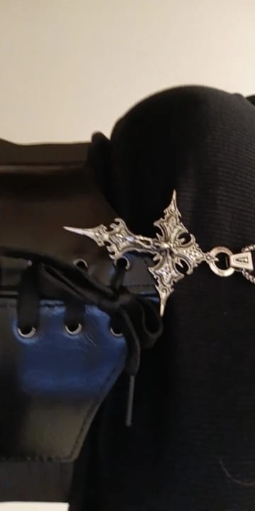 Customer photo review of Spire Cross Necklace