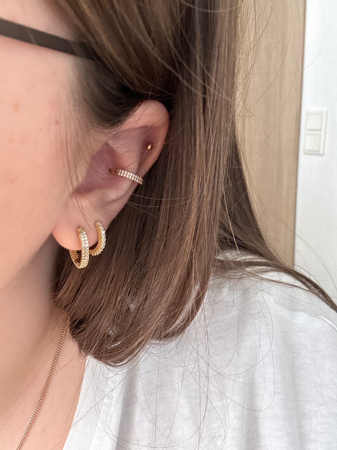Customer photo review of Double Conch Piercing | Titan