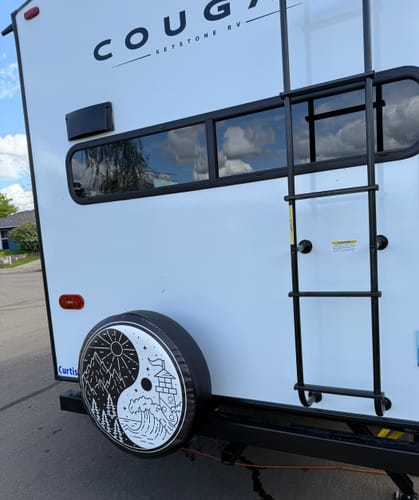 Customer photo review of Mountains Meet Ocean Yin Yang Spare Tire Cover - Jeep, Bronco, RV, Camper, Trailer, FJ Cruiser, & More