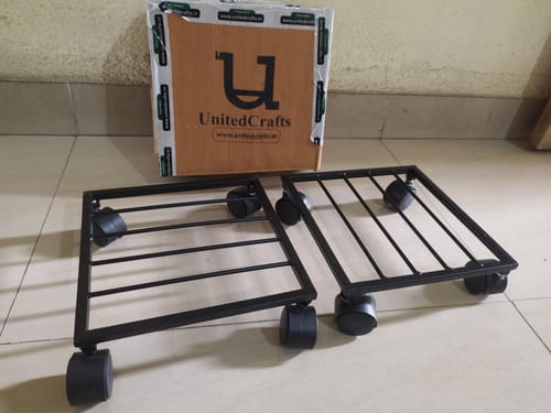 Customer photo review of United Crafts Rozy Wheel Pot Stands for Planters