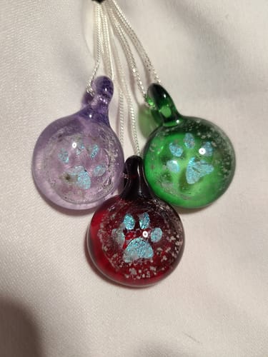 Customer photo review of Pawprint Foil Pendant with Cremation Ash