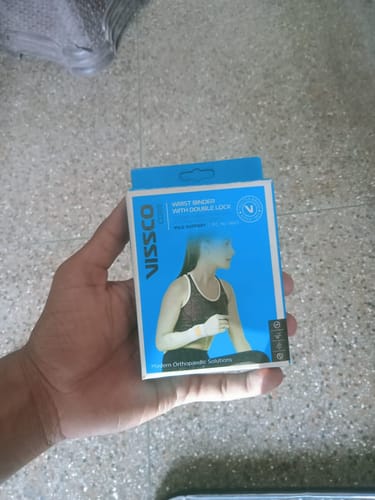 Customer photo review of Wrist Binder With Double Lock (Mild Support)| Provides Firm Grip &  Support for  to the Wrist  for Sports & Workout (Grey)