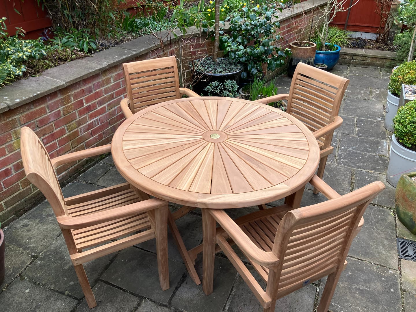 Customer photo review of Teak Garden Furniture Set 120cm Round Sunshine Table 4 x Oxford Stacking Chairs Cushions Included