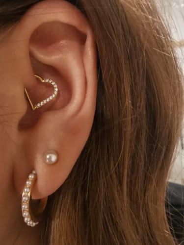 Customer photo review of Heart Clicker Piercing | Titan