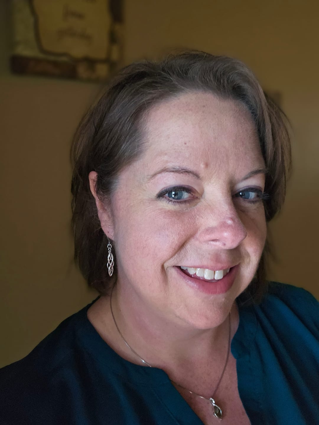 Customer photo review of Infinity Loops Dangles Hypoallergenic Earrings for Sensitive Ears Made with Plastic Posts