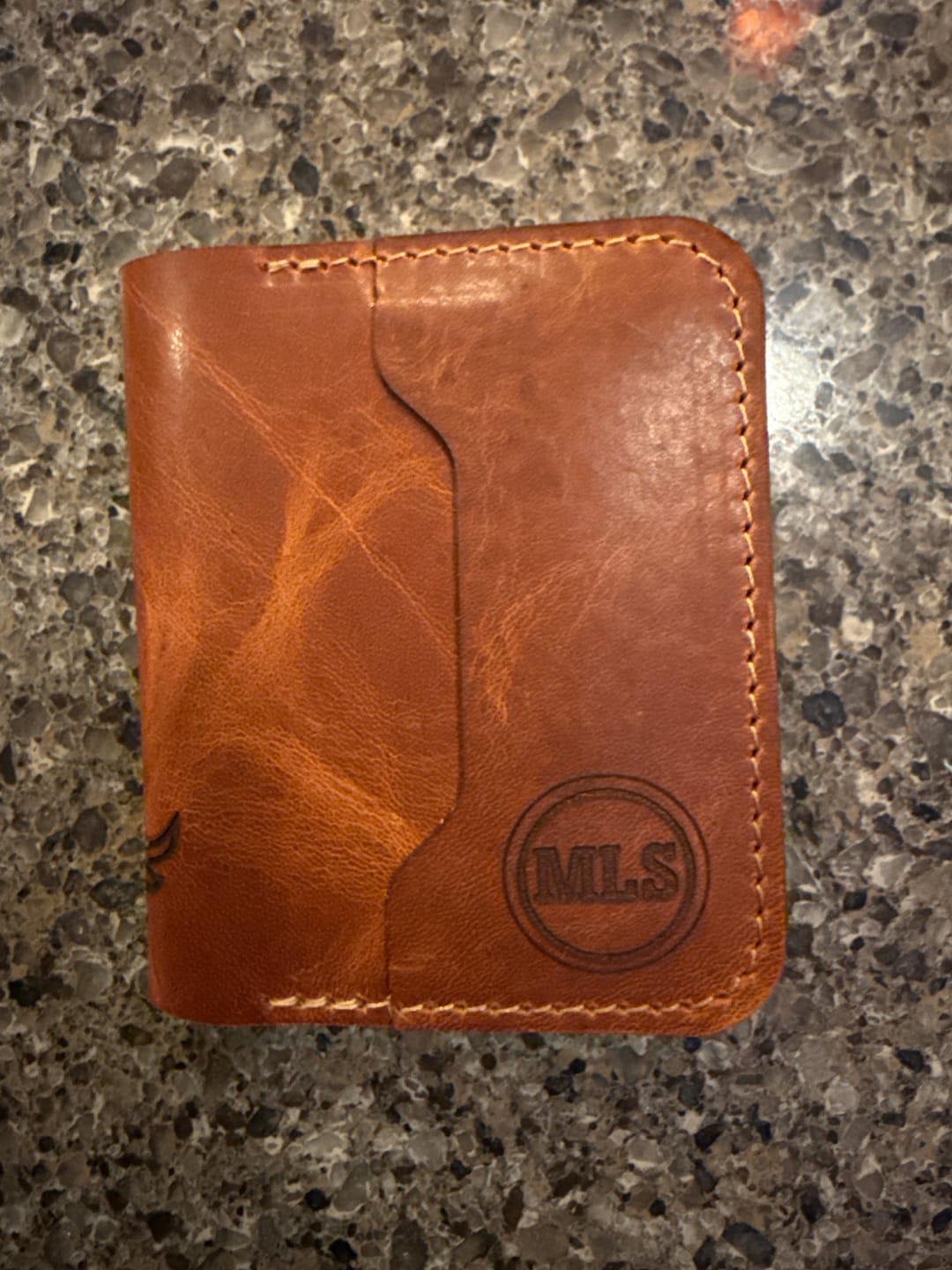 Customer photo review of Minimalist Badge Wallet