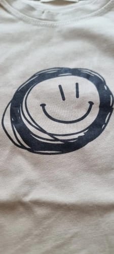 Customer photo review of Neutral Smiley Face T-Shirt