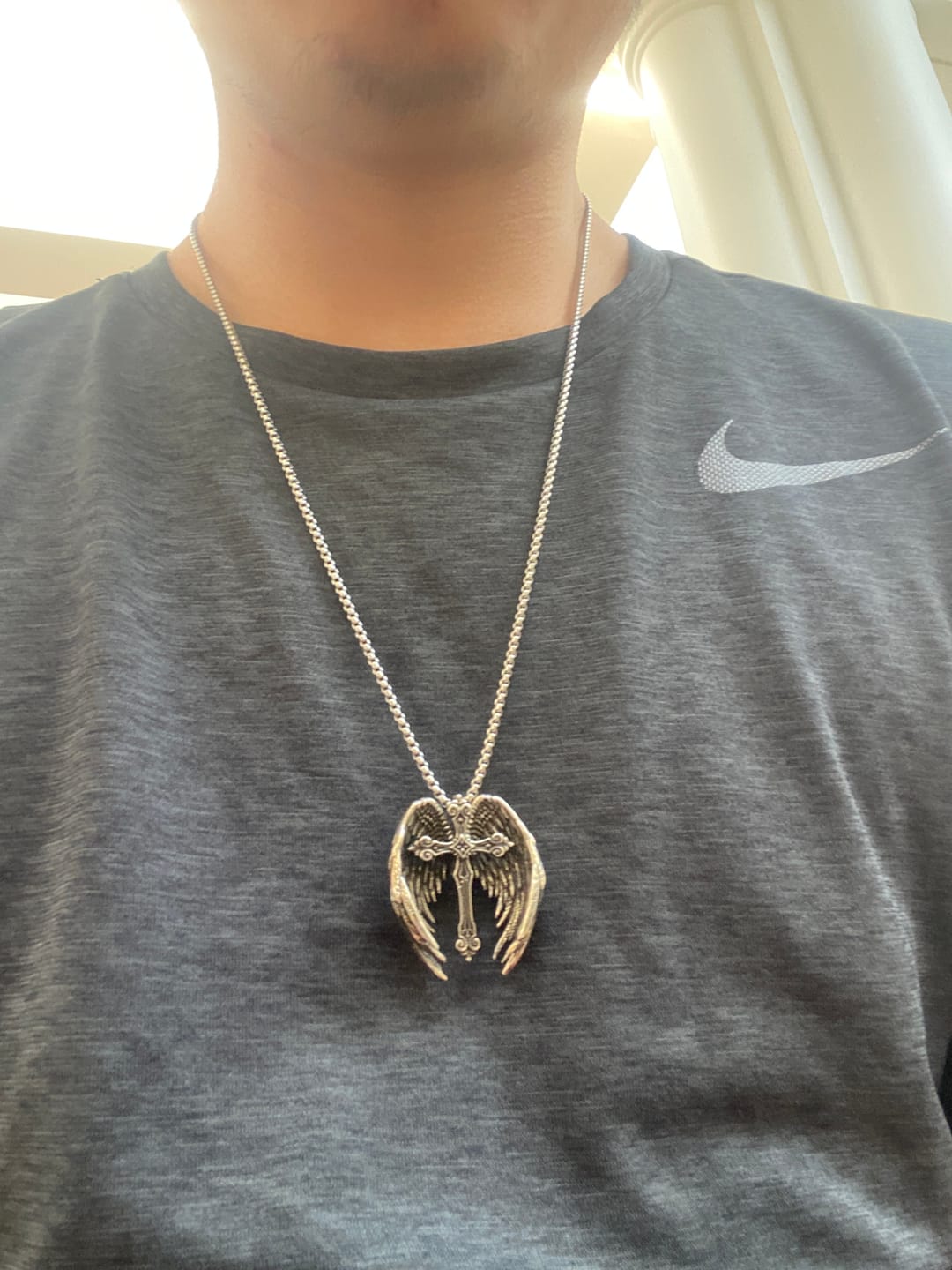Customer photo review of Angel Cross Necklace
