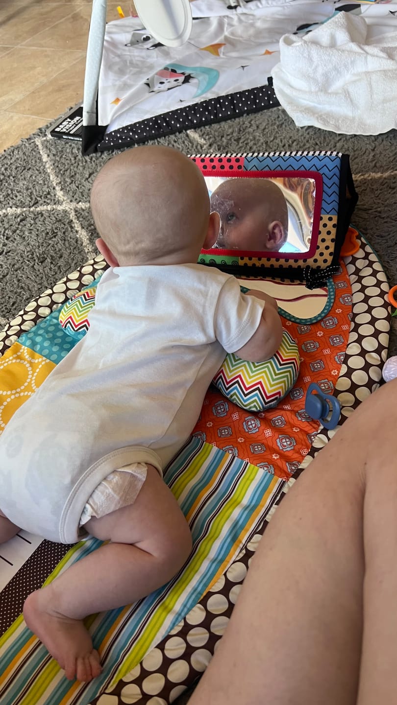 Customer photo review of Tummy Time Foldable Mirror with Interactive Sensory Book