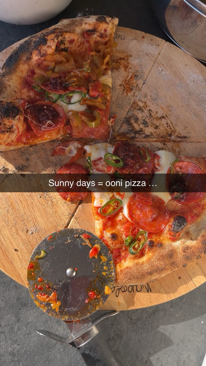 Customer photo review of Topped Spicy Pizza