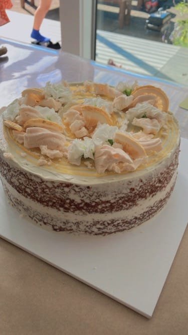 Customer photo review of lemon meringue cake