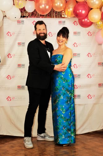 Heather A. review of Cleo Strapless Column Gown by Theia Couture - RENTAL image 1 out of 2