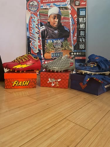 Customer photo review of Tom and Jerry "Cheddar Chase" Football Cleats - Quantum Speed by Phenom Elite