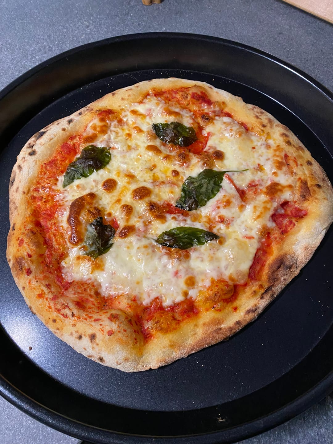 Customer photo review of Topped Margherita Pizza