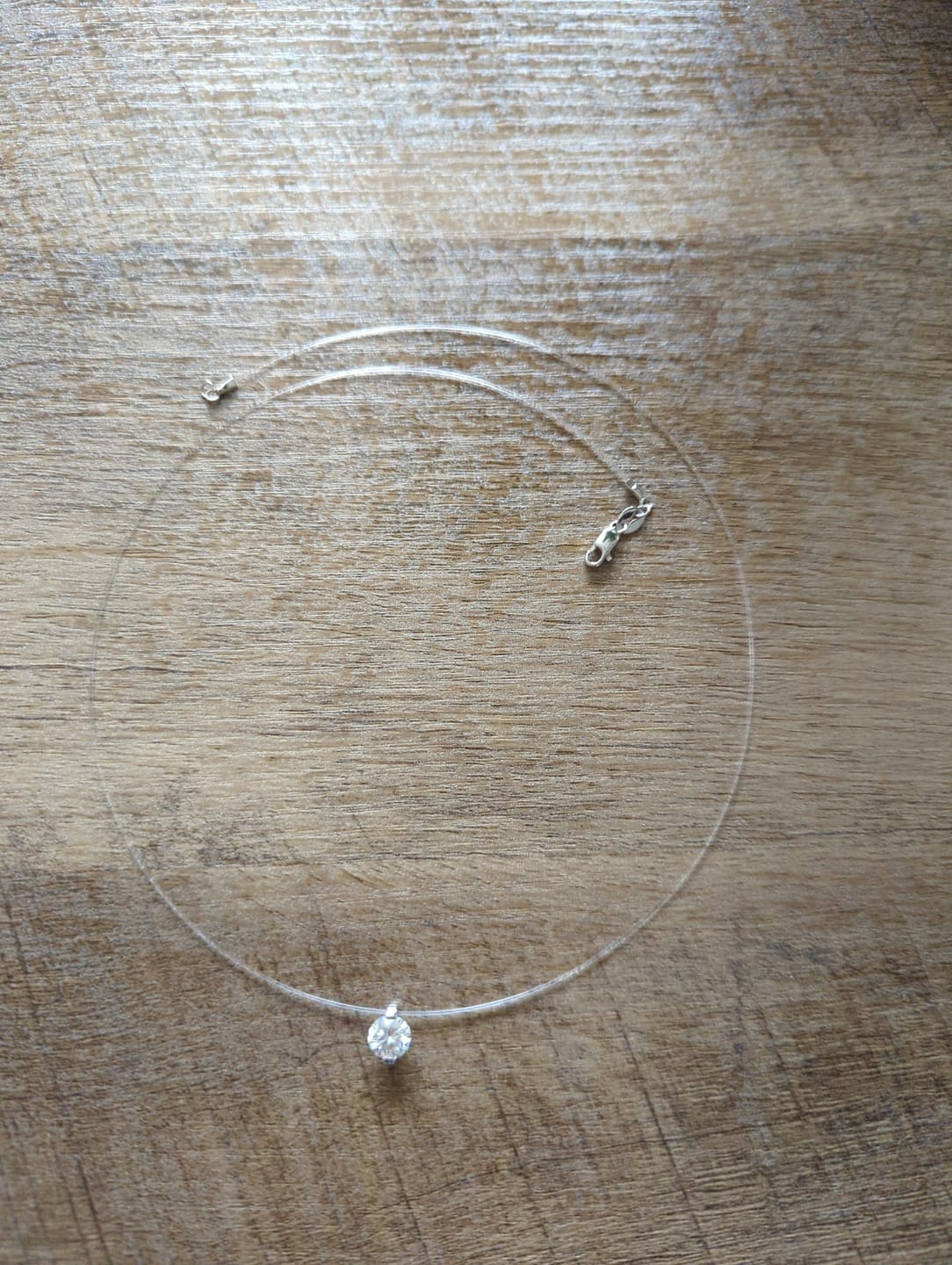 Customer photo review of Solitaire Moissanite Fish Line Choker Invisible Chain Necklace