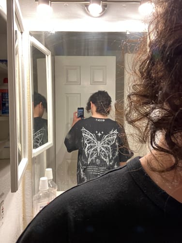 Customer photo review of Metamorphosis Tee