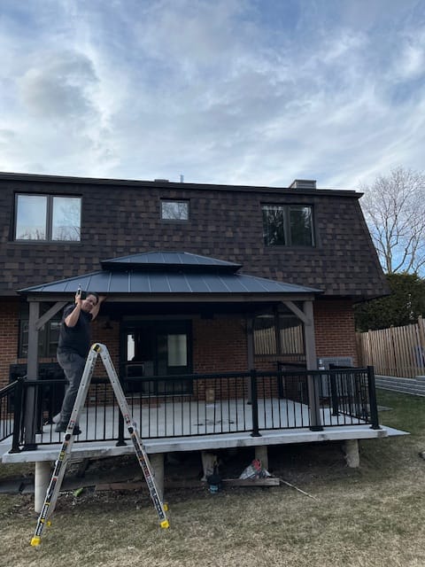 Customer photo review of SUNJOY Outdoor Patio 13' x 15' 2-Tier Wooden Frame Backyard Hardtop Gazebo with Ceiling Hook