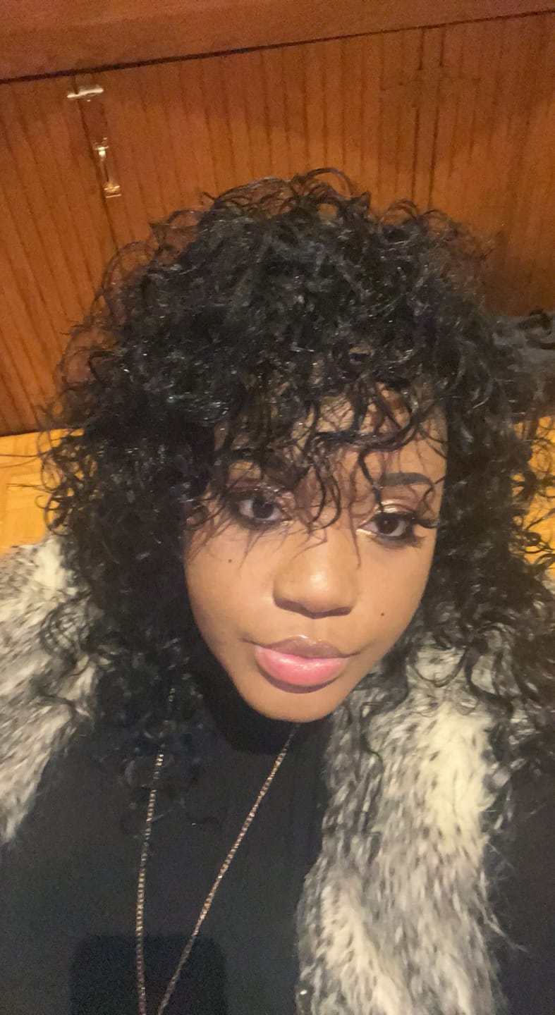 Customer photo review of Outre Quick Weave Half Wig AMBER
