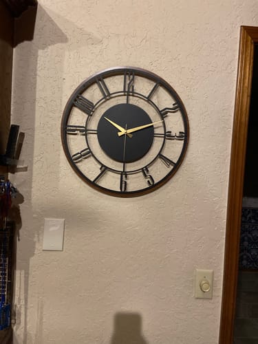 Customer photo review of METAL WALL CLOCK with Wooden Corners