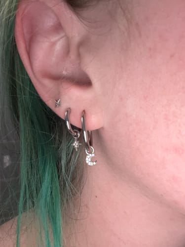 Customer photo review of My Huggies Hoop Earrings