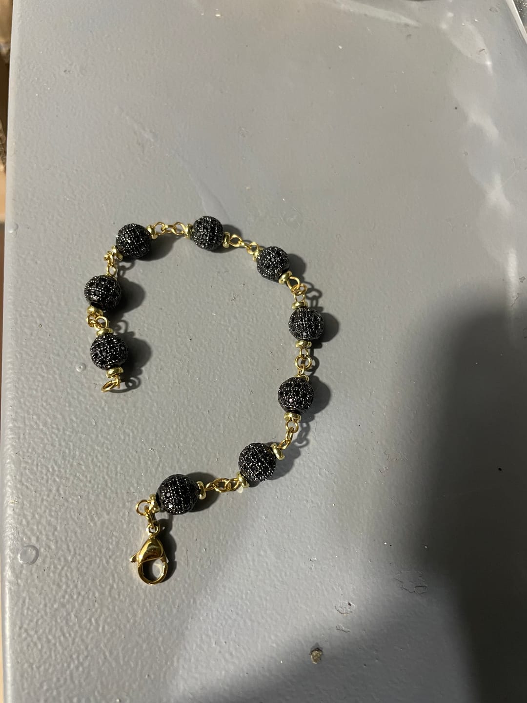 Customer photo review of BALLS BRACELET - GOLD/BLACK