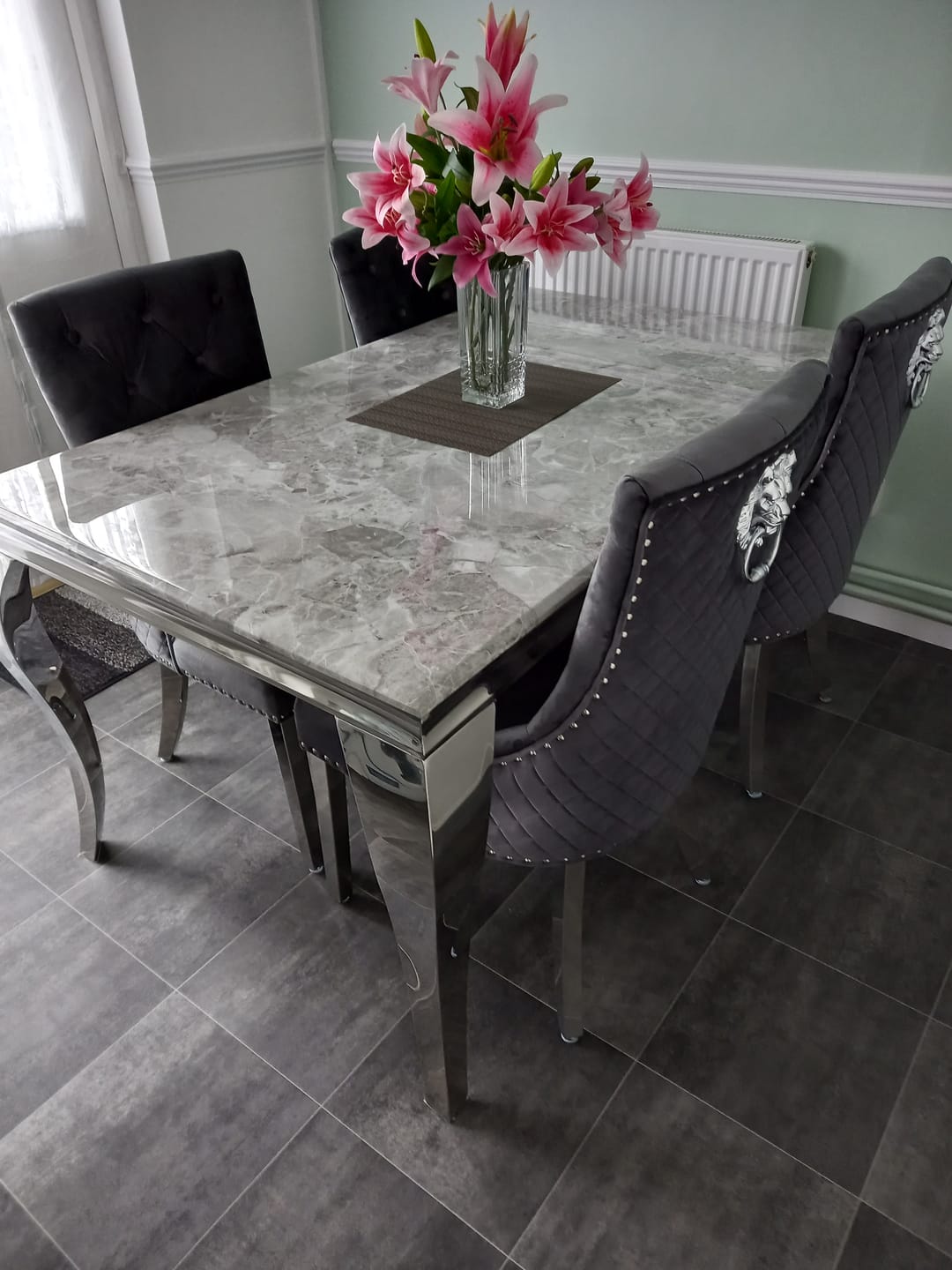 Customer photo review of Vienna Marble Dining Table With Bently Knocker Chairs lion