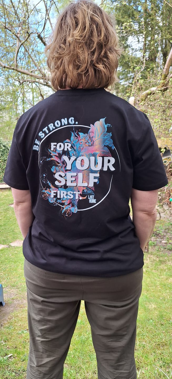 Customer photo review of Be strong Tee