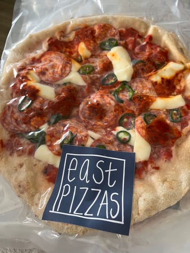 Customer photo review of Topped Spicy Pizza