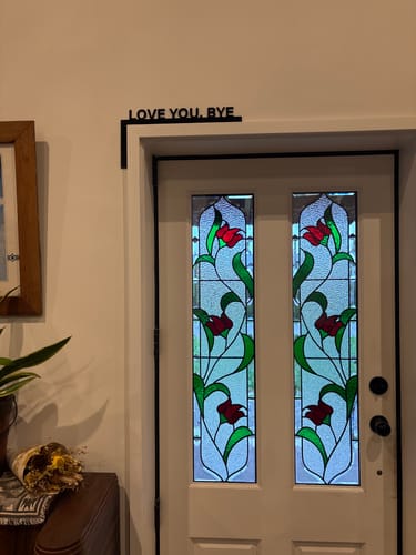 Customer photo review of Love You Bye Door Frame Sign