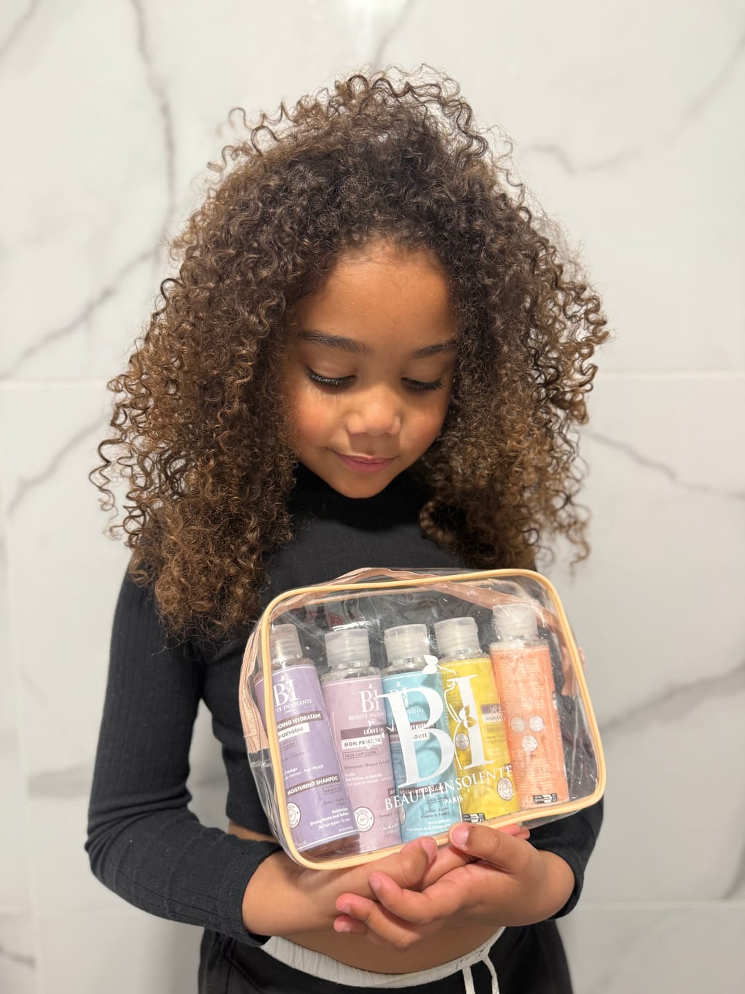 Customer photo review of TROUSSE CHEVEUX FRISÉS