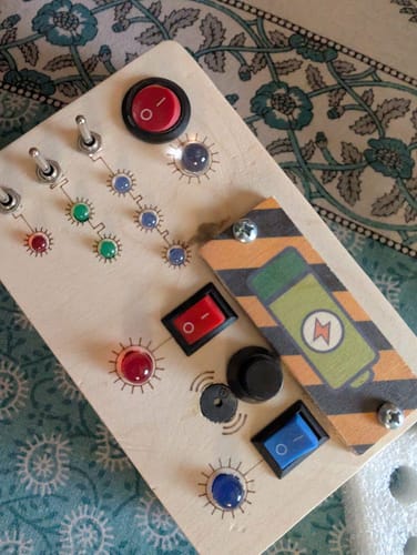 Customer photo review of Montessori Toggle Play & Tinker Pad Busy Board (Combo V6/V2)