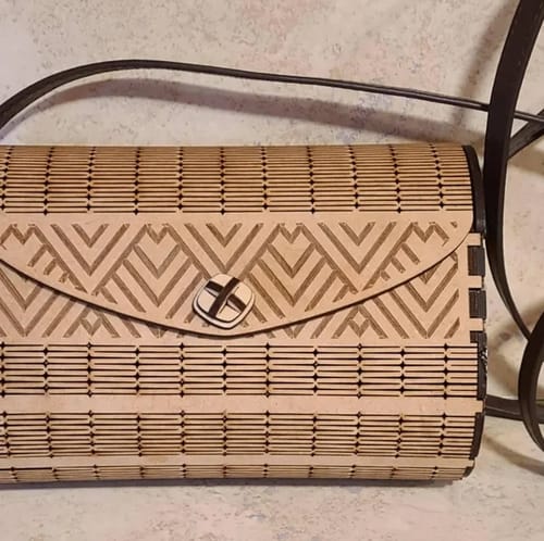 Customer photo review of Laser cut wooden clutch handbag svg template file