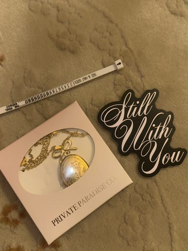 Customer photo review of TXT Member Locket Necklaces