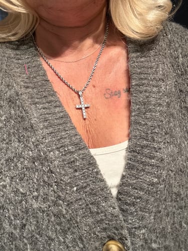 Customer photo review of MOISSANITE CROSS PIECE PENDANT.