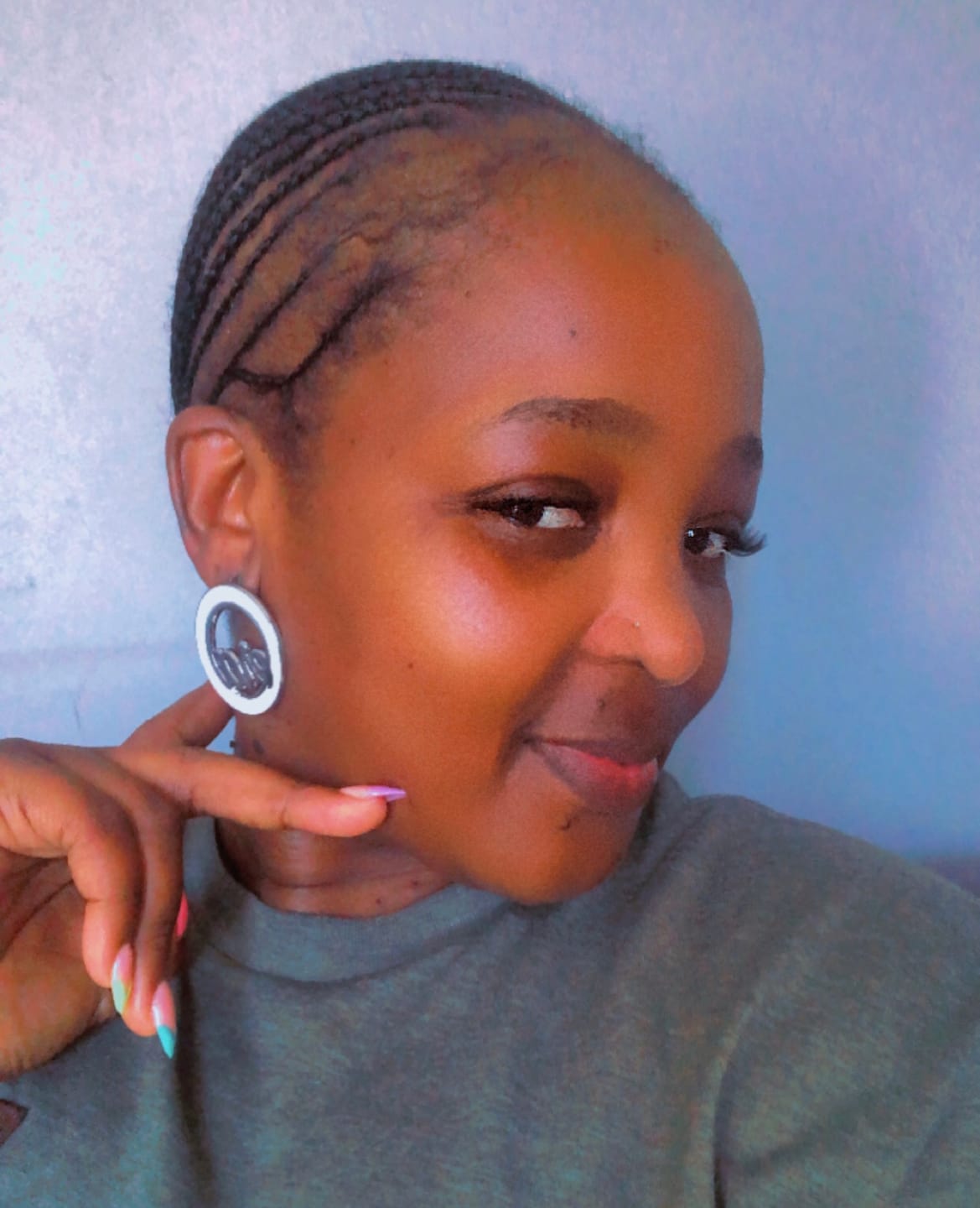Customer photo review of Silver Thando Studs
