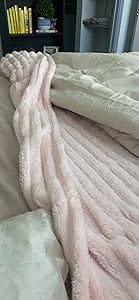 Customer photo review of STRIPED RABBIT FAUX-FUR BLANKET - 50% OFF