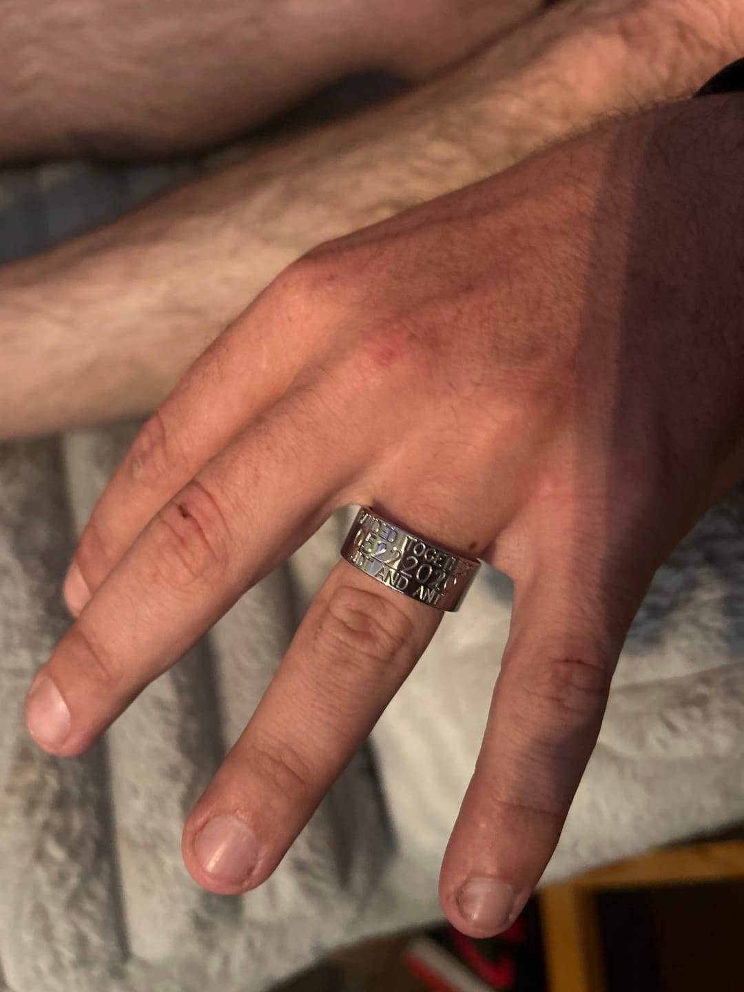 Customer photo review of Duck Band Wedding Ring - 10mm Titanium