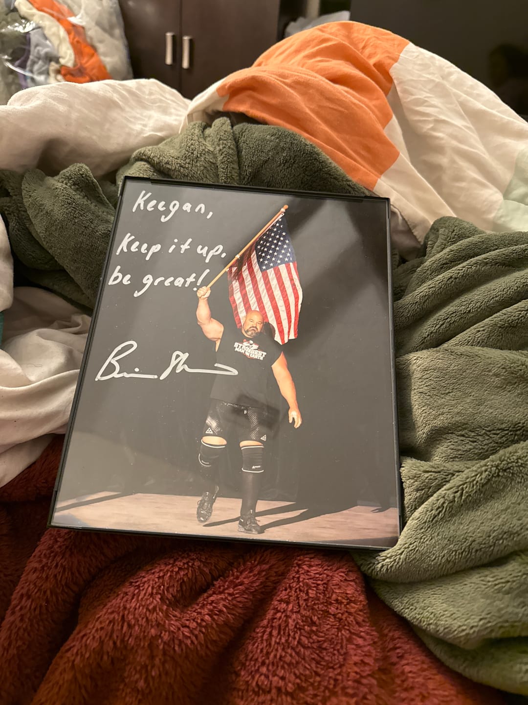 Customer photo review of PERSONALIZED STRONGEST MAN ON EARTH PICTURE