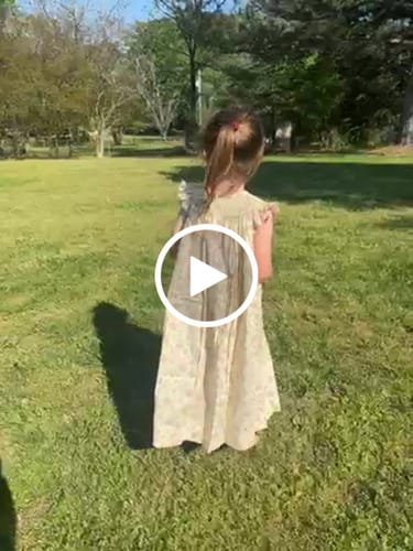 Customer video review of Fluffy Bunny Yellow Floral Smocked Dress