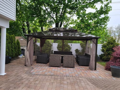Customer photo review of Homrest 12' x 16' Patio Hardtop Gazebos Canopy Polycarbonate Double-Roof w/ Netting & Curtains