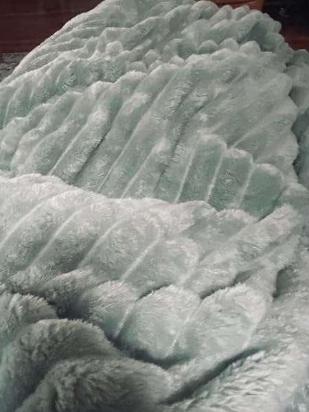 Customer photo review of STRIPED RABBIT FAUX-FUR BLANKET - 50% OFF