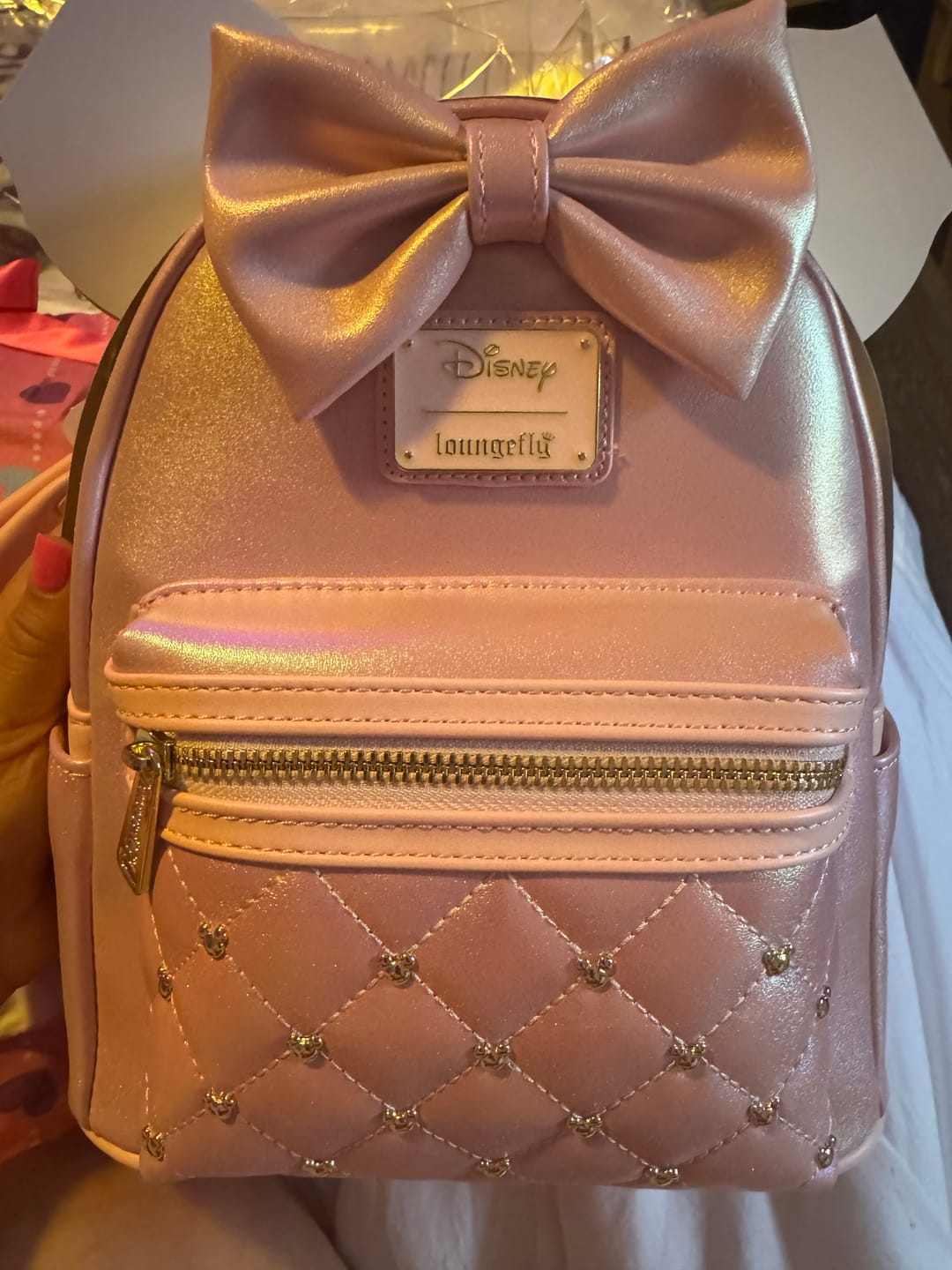 Customer photo review of Loungefly Disney The Minnie Mouse Classic Series Mini Backpack: Rose Iridescent - 707 Street Exclusive