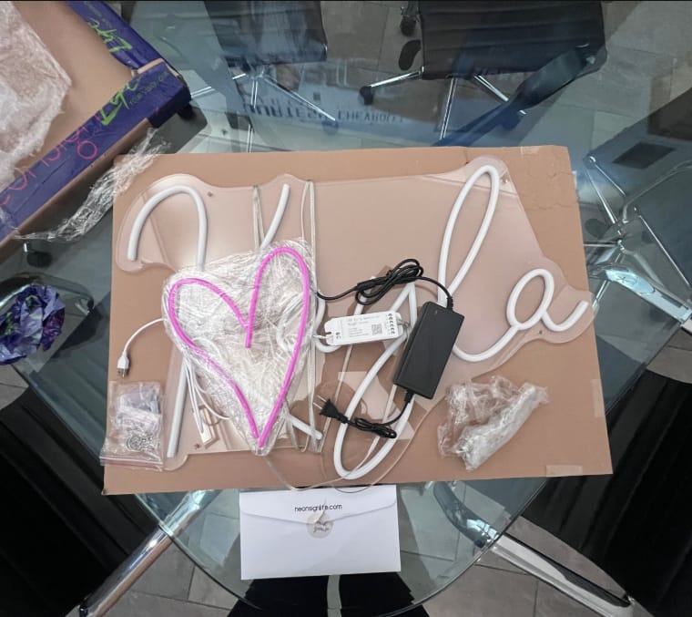 Customer photo review of Custom Made Neon Signs Bring Your Imagination to Life